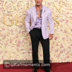 Dwayne Johnson in a lavender blazer